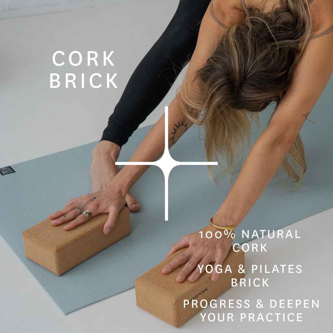 A woman in black leggings performs a yoga pose on a light blue mat while using two natural cork yoga blocks. White text overlays read 'CORK BRICK' and '100% NATURAL CORK YOGA & PILATES BRICK PROGRESS & DEEPEN YOUR PRACTICE'.